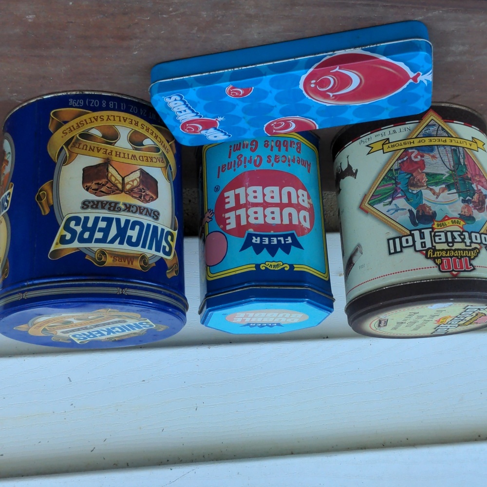 4 metal candy or gum tins, some dents, overall good shape and usable, vintage